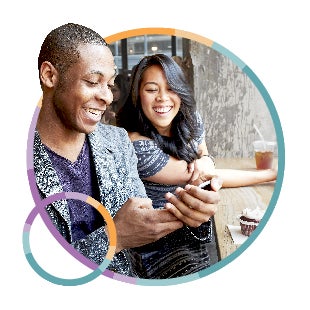 Two diverse employees using mobile hiring software